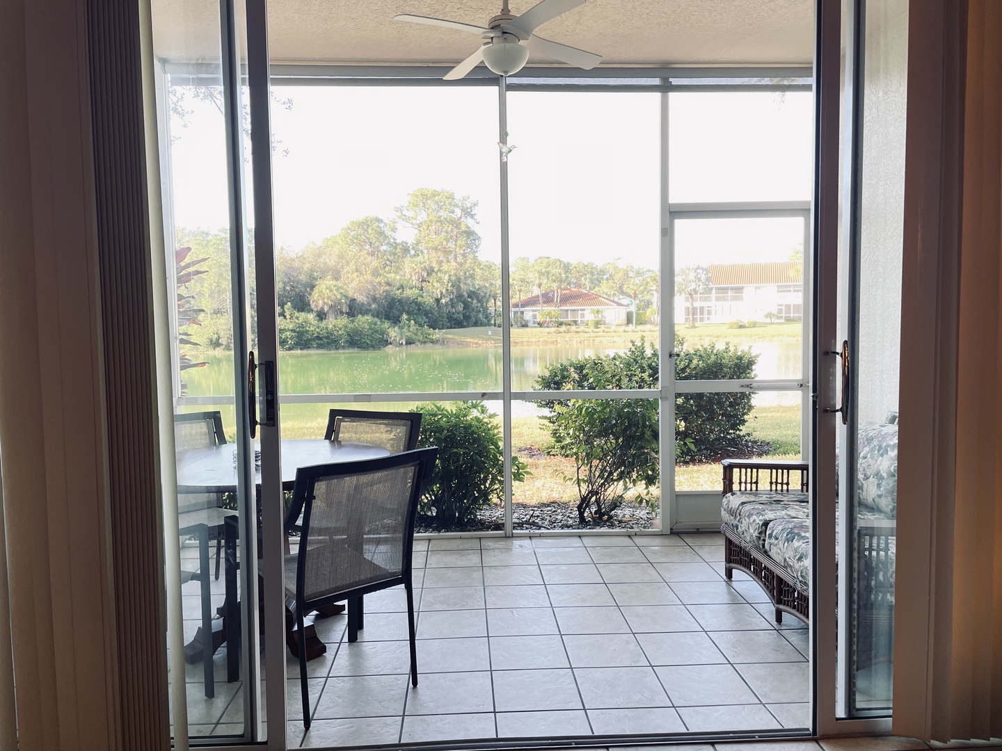 Step onto your private terrace and soak in peaceful views of the lake and lush landscaping - your perfect outdoor retreat awaits.