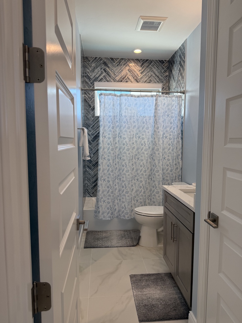 Step into your luxurious bathroom featuring a stunning walk-in shower with elegant tile work and modern fixtures for your ultimate relaxation.
