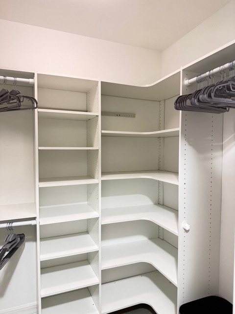 Main bedroom Closet 2 Your spacious walk-in closet offers generous shelving and hanging space to keep all your belongings perfectly organized during your stay.