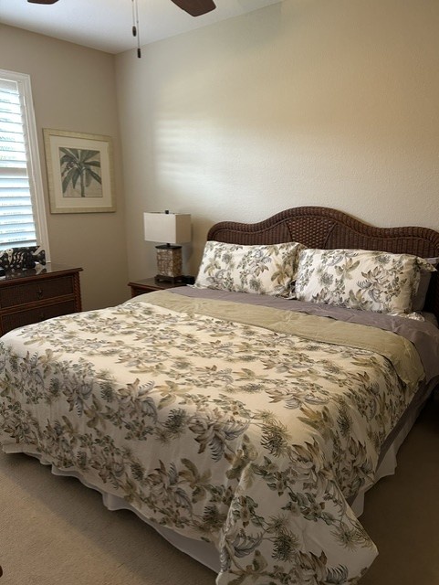 Sink into your plush bed after a day of exploring, with gentle light filtering through plantation shutters and tropical accents setting a soothing tone.