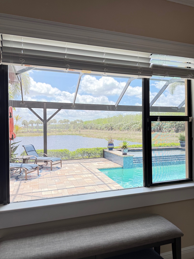 Wake up to stunning views of the sparkling pool and tropical landscape right from your window.