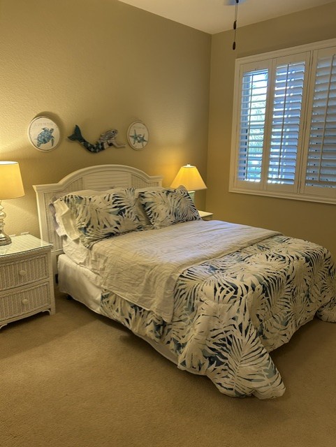 Unwind in your peaceful bedroom with coastal accents, soft lighting, and a welcoming bed that invites restful sleep after a day of adventure.