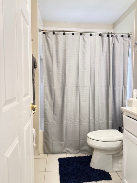 Second Full bath Step into your private bathroom with a refreshing shower and all the essentials for a comfortable stay.