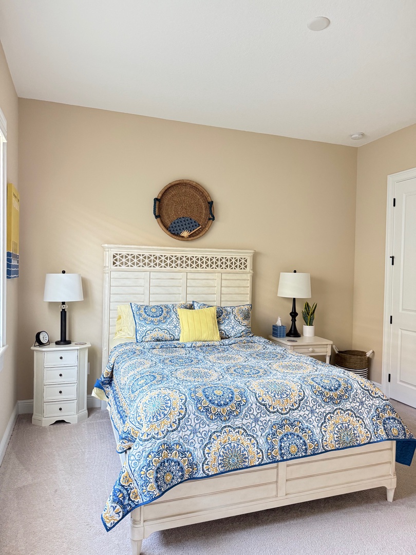 Second bedroom queen Sink into your peaceful sanctuary, where blue paisley bedding and coastal touches create a soothing retreat for restful nights.