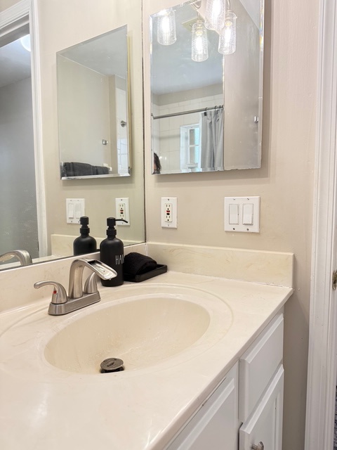 Second bathroom. Your modern bathroom features a pristine vanity with premium amenities, perfect for refreshing mornings and relaxing evenings.