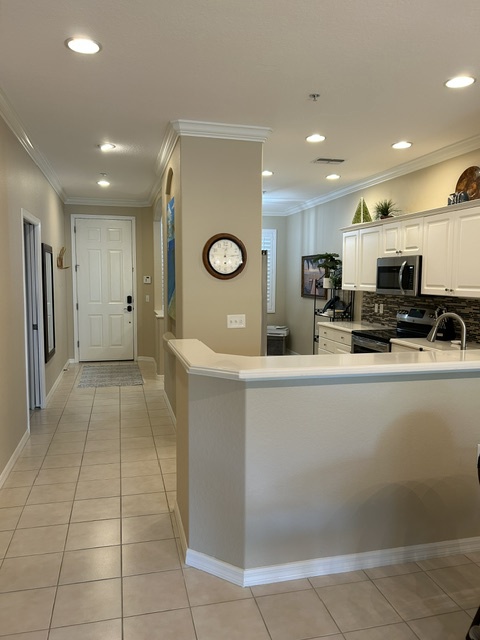 Step into your welcoming home base with bright, open spaces flowing seamlessly together. The full kitchen invites you to whip up meals while staying connected to the living area, making it easy to relax and enjoy your time here.