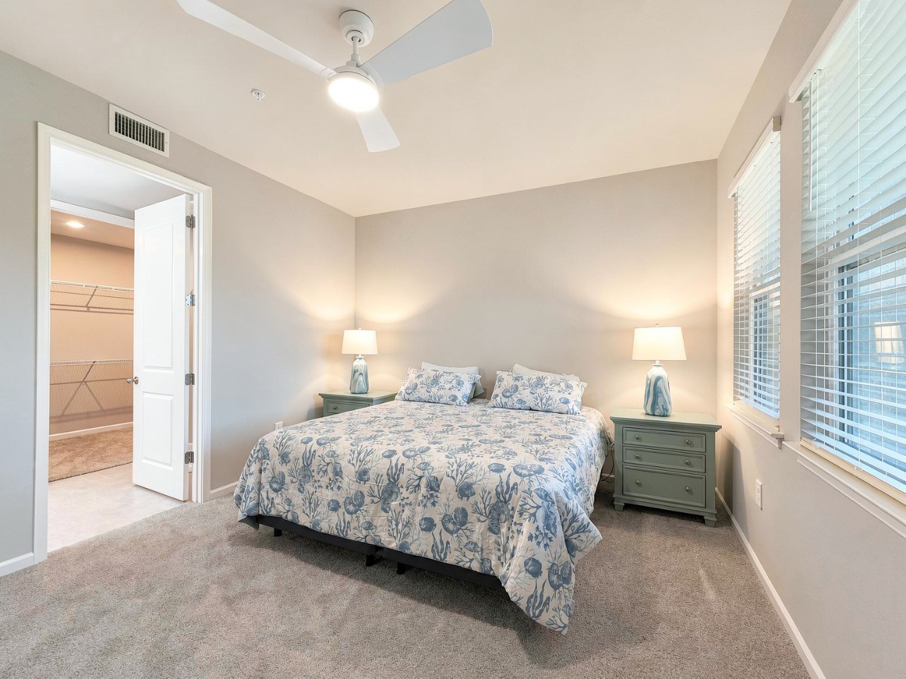 Slip into soft sheets under the gentle glow of bedside lamps and drift off to the soothing rhythm of the ceiling fan overhead.