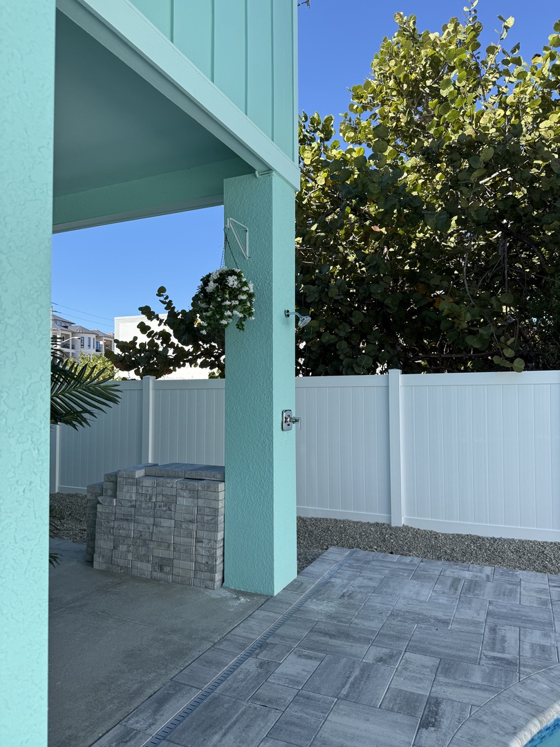 Modern property featuring a refreshing swimming pool surrounded by contemporary architecture and lush tropical landscaping.