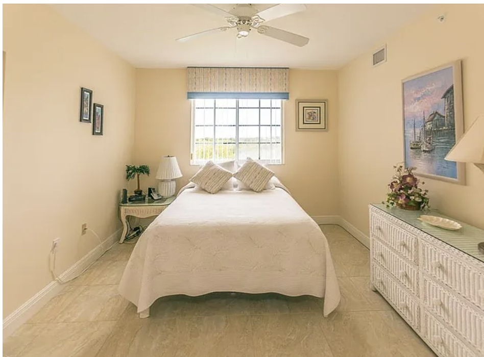 Wake up to soft morning light in your peaceful bedroom retreat. The crisp linens and coastal decor create a relaxing atmosphere perfect for unwinding after your day.