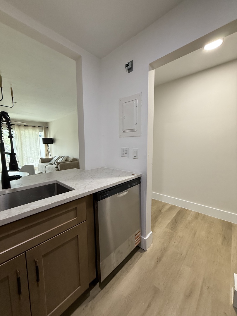 Your modern kitchen features sleek appliances and clean lines, perfect for preparing meals during your stay.