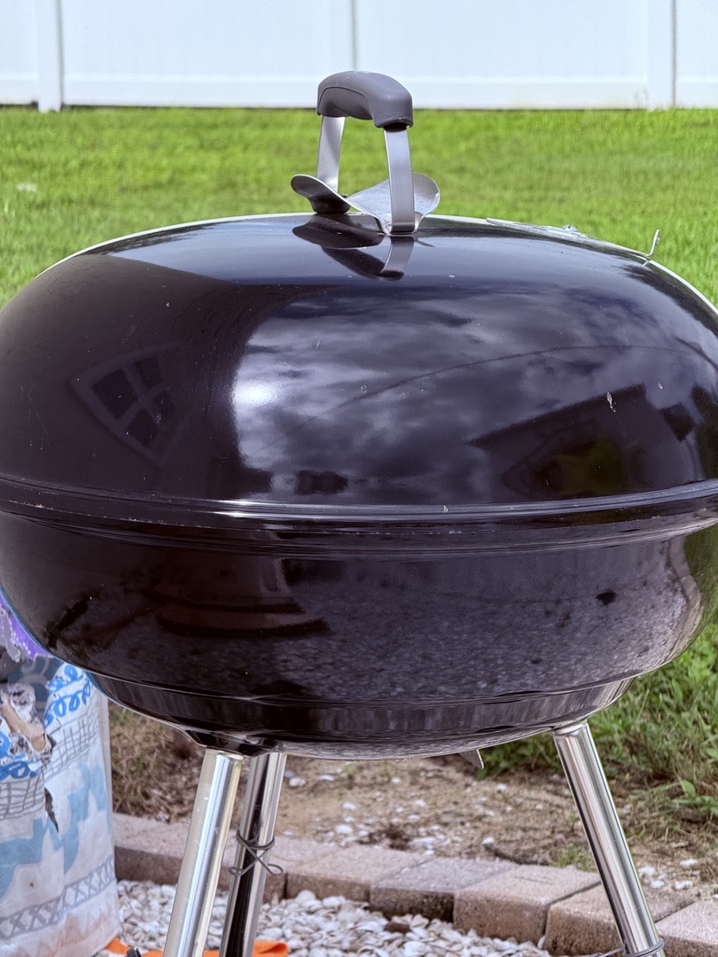 Fire up your next outdoor meal on this charcoal grill, perfect for smoky barbecue flavors right on the property grounds.