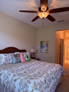 Sink into your cozy retreat with a queen-sized bed dressed in soft linens, gentle overhead lighting, and a peaceful ambiance that invites you to unwind completely.