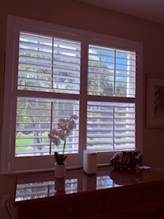 Your bright window seat offers a peaceful spot to curl up with a book, with plantation shutters to adjust the light just how you like it.