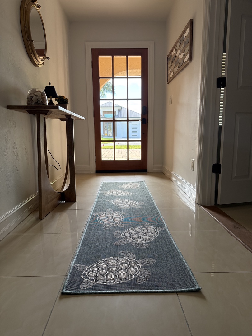 Enter through a traditional Naples home front door