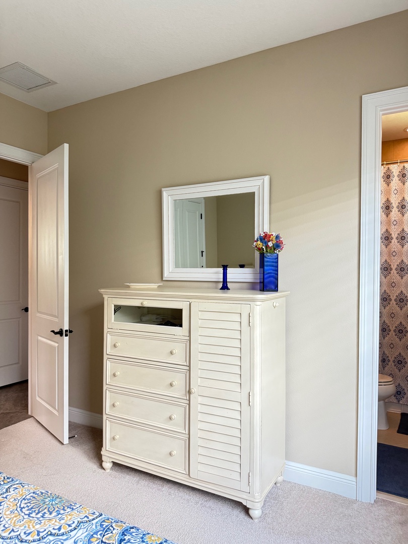 Queen bedroom with shared bath tub shower to twin bedroom and common area