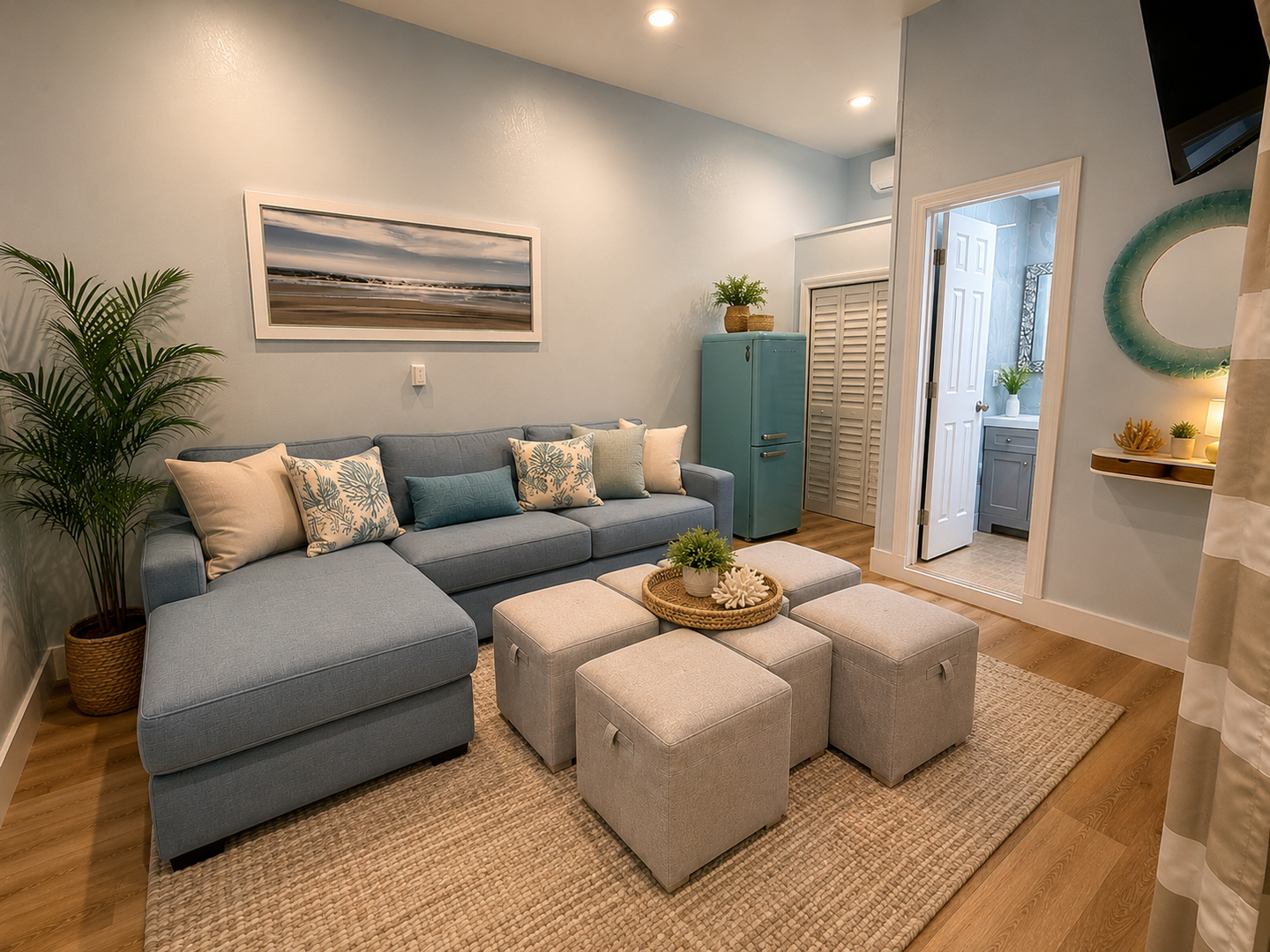 Sink into plush cushions and unwind in your inviting coastal retreat, where calming blues and natural textures create the perfect atmosphere for relaxation after your adventures.