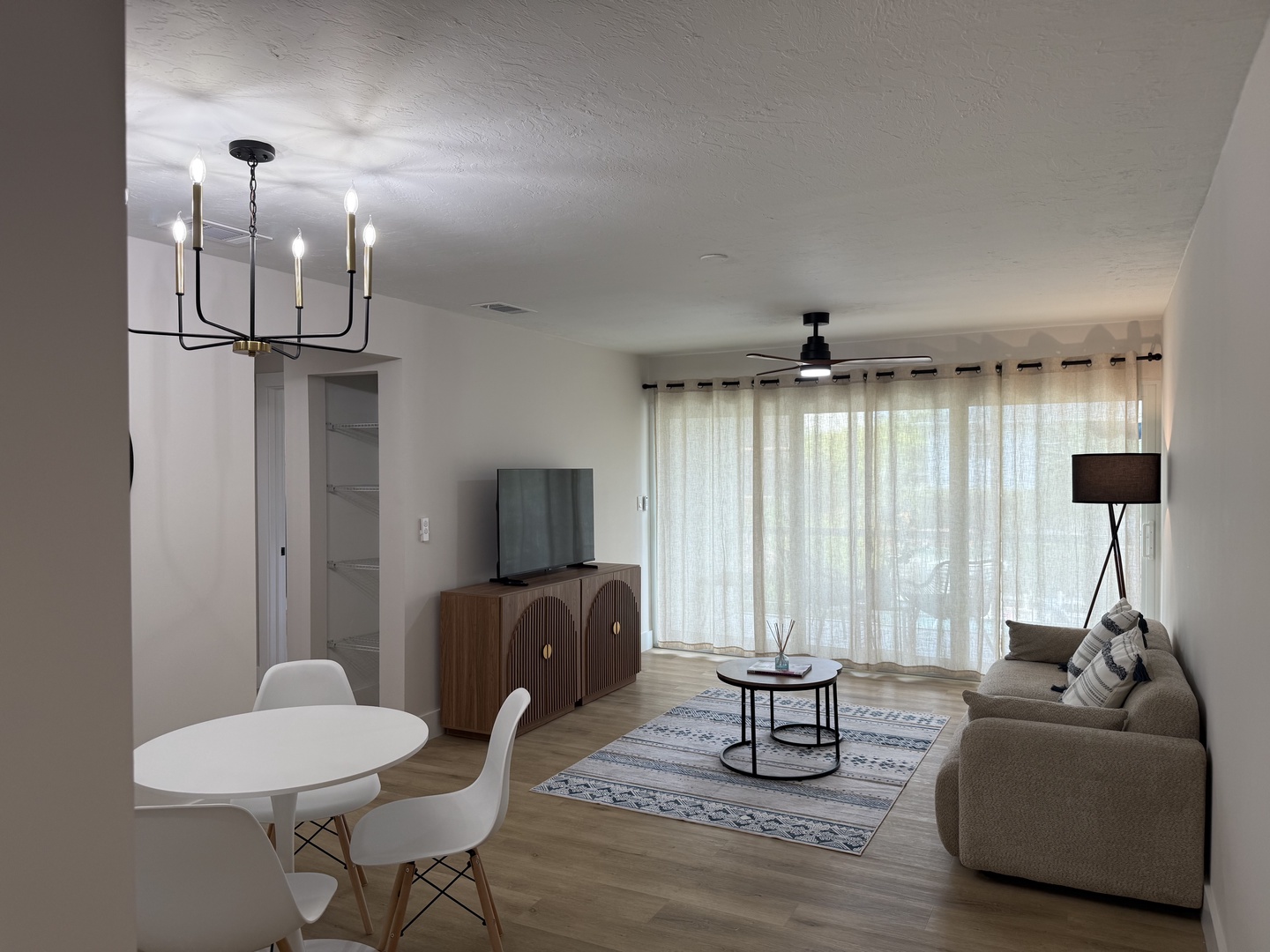 Relax in your bright, modern living space featuring stylish furnishings, natural light, and thoughtful design touches that create the perfect home base.