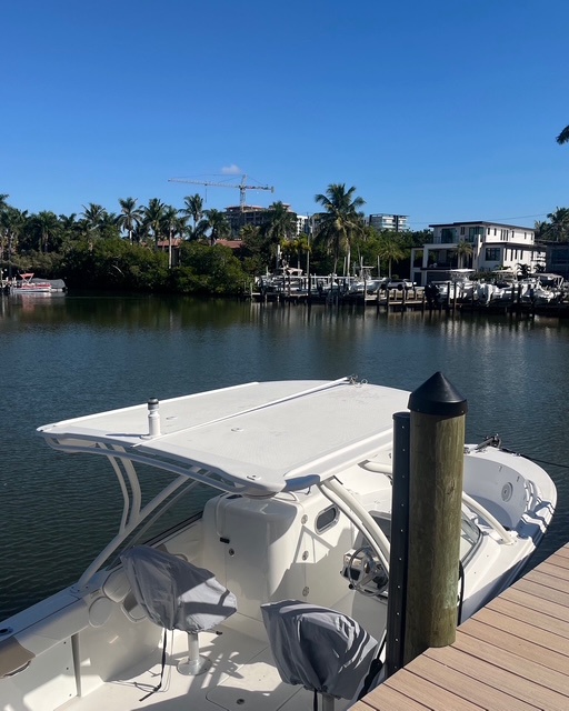 Your own private boat slip awaits at this waterfront property, with calm waters perfect for exploring the scenic coastal area by day.