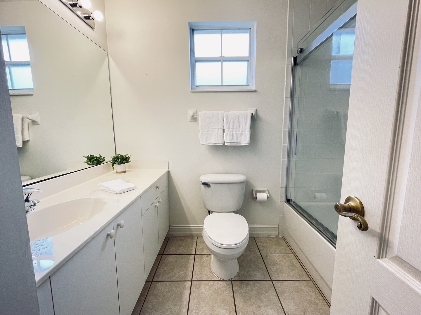 Second bathroom with tub_shower combo