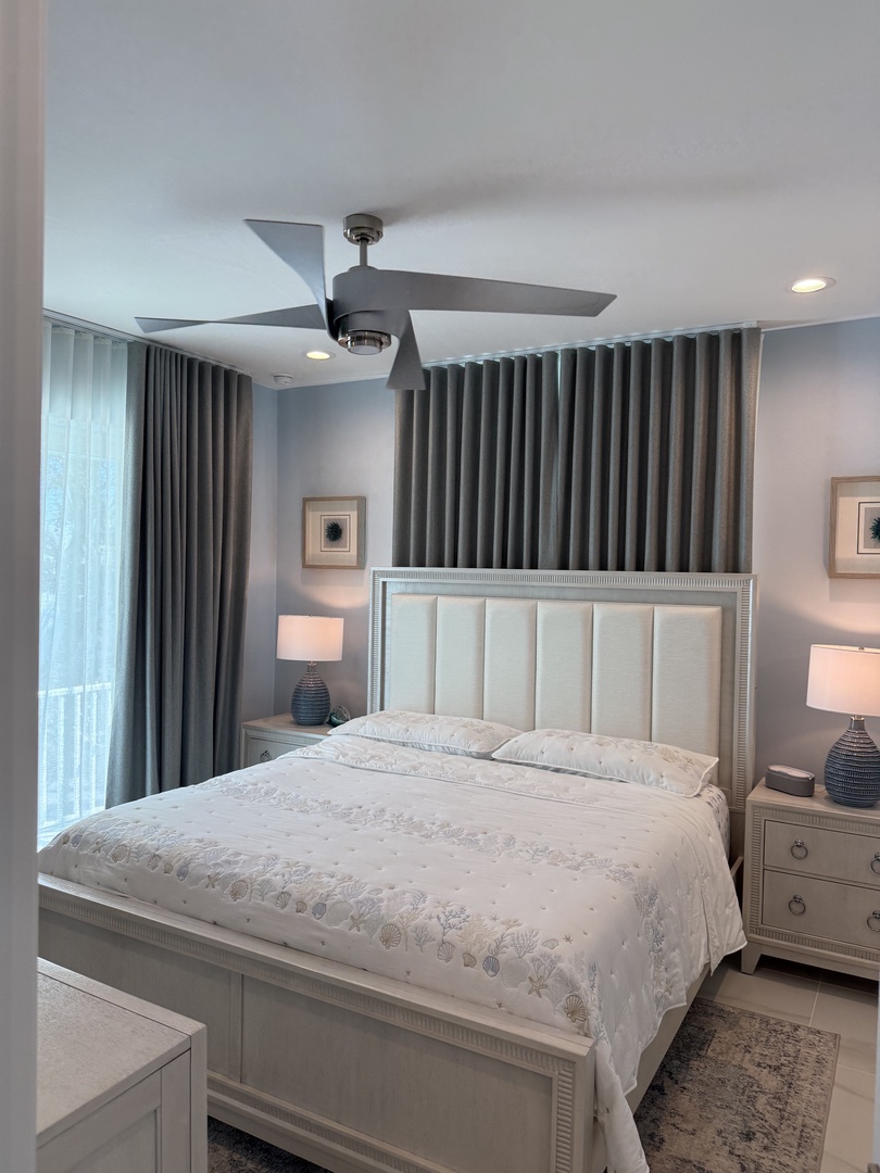 Rest peacefully in your elegant bedroom with crisp linens, soft lighting, and thoughtful touches that make this space feel like home.
