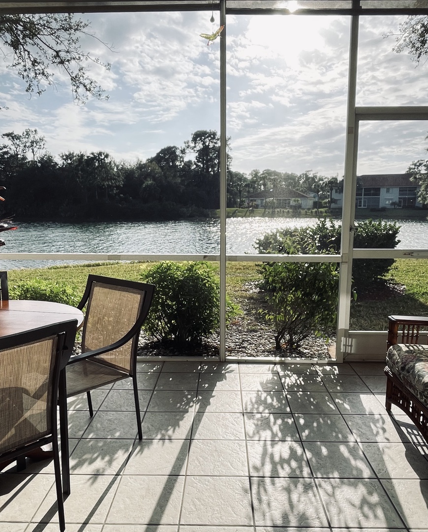 Sip your morning coffee on your private patio while gazing at the tranquil lake through floor-to-ceiling windows.
