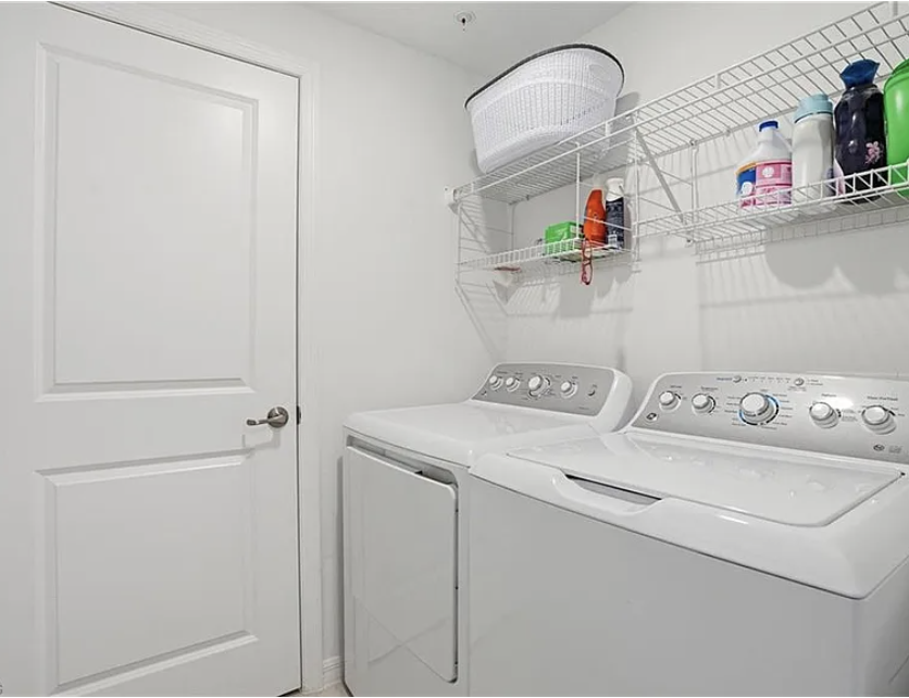 Handle your laundry with ease using these full-size machines and convenient shelving for all your detergent and supplies.