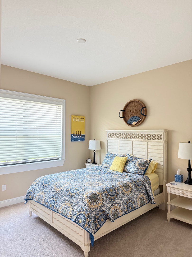 Second bedroom Queen, Sink into your comfortable bed with vibrant blue paisley linens and enjoy the bright, airy atmosphere of your welcoming bedroom retreat.