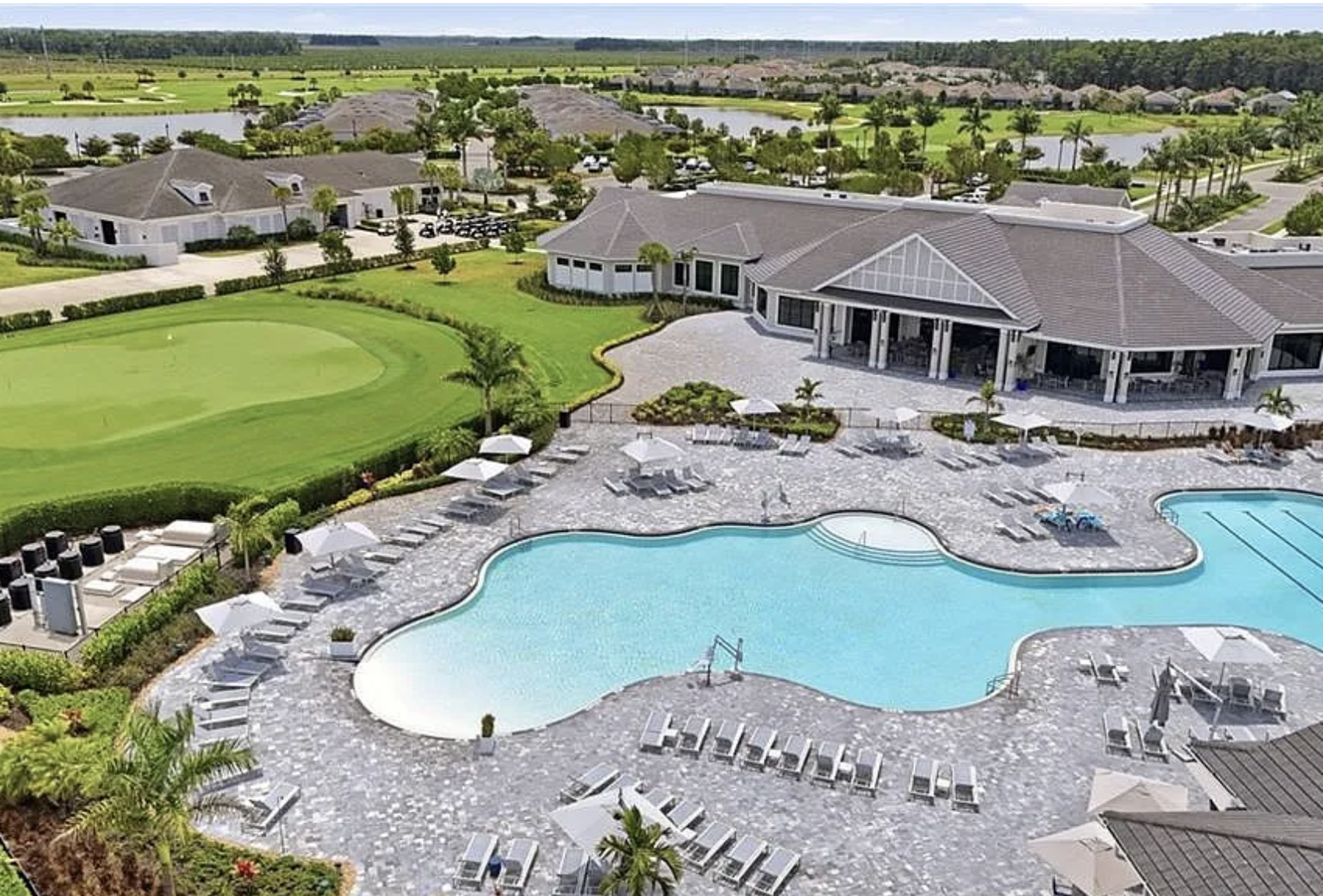 The property sits within a pristine gated golf community featuring championship greens, palm-lined fairways, and resort-style pools perfect for sunny Florida days.