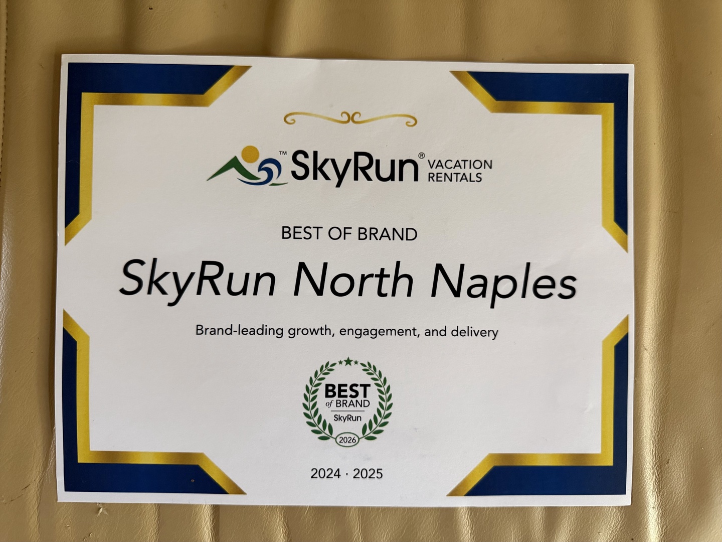 The SkyRun North Naples property proudly displays its Best of Brand award, recognizing outstanding growth, engagement, and service delivery for 2024-2025.