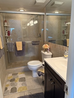 Step into your modern, sparkling bathroom—relax in the spacious walk-in shower, freshen up at the sleek vanity, and enjoy all the comforts you need.