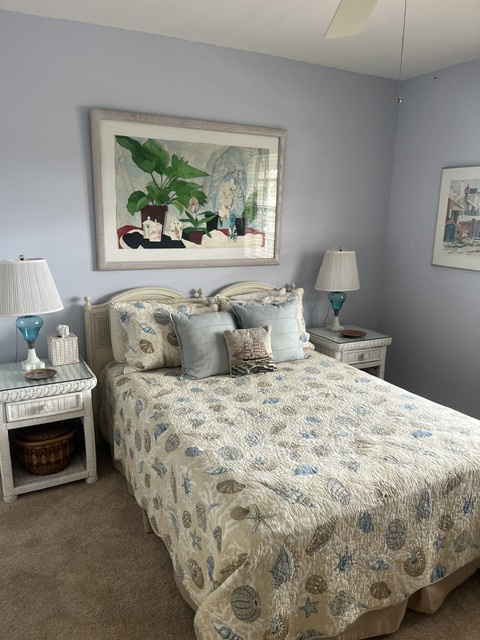 Slip into comfort in your serene bedroom retreat. Soft linens, calming coastal tones, and bedside lamps create a peaceful haven for restful nights.
