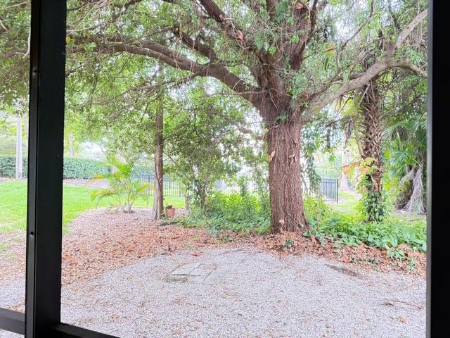 Beautiful garden view featuring mature trees and landscaped grounds visible from your accommodation.