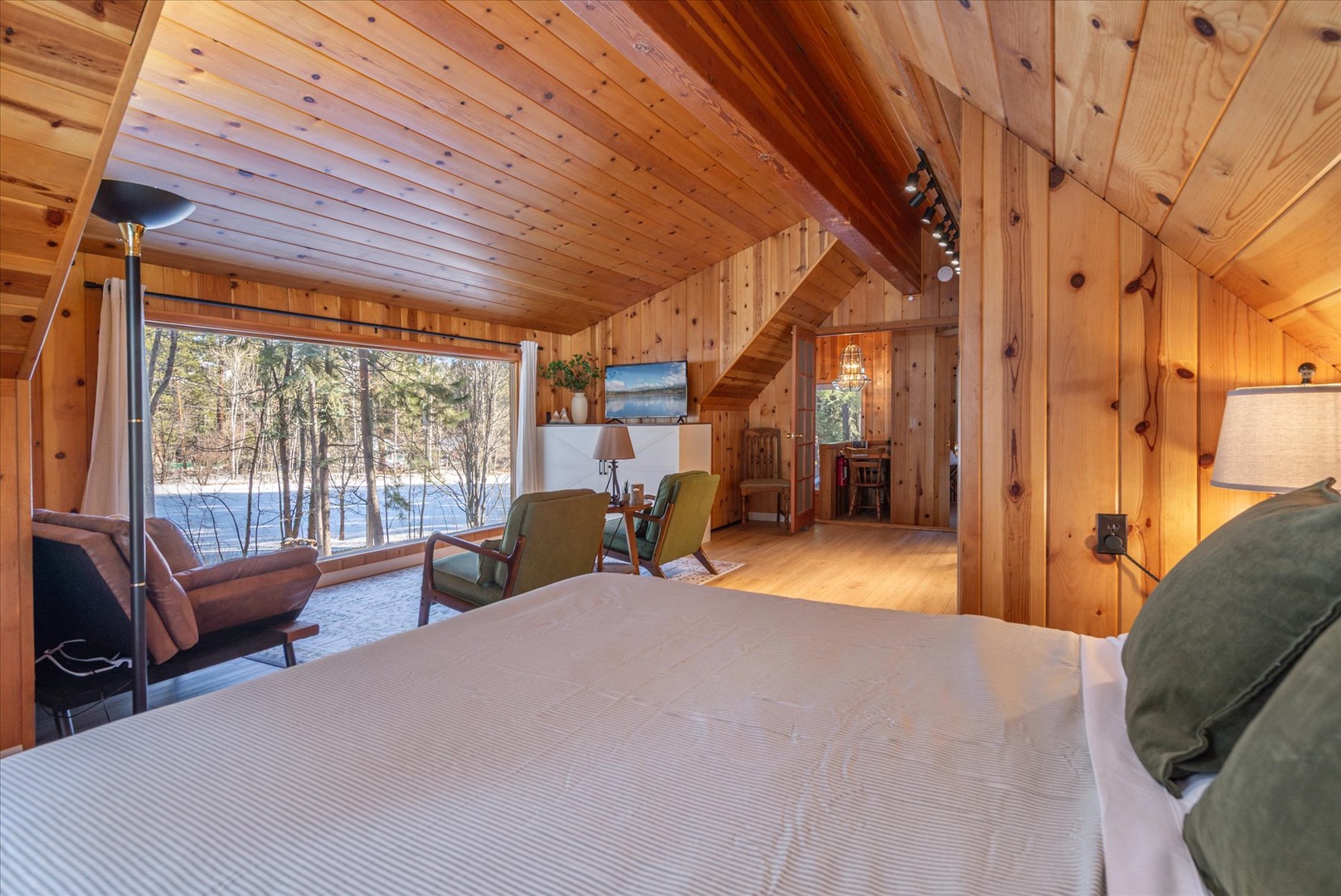 Enjoy the beautiful nature and golf course views from the comfort of your bed.