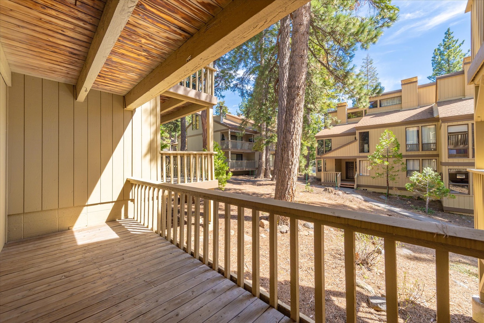Step onto your private balcony off the master bedroom and breathe in fresh mountain air while admiring towering pines and peaceful forest views.