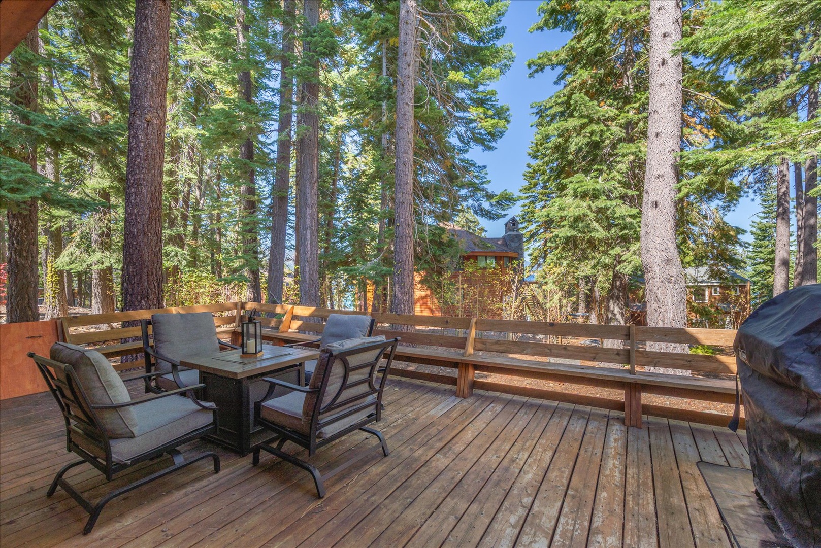The large deck located off the living room is the perfect place to enjoy the outdoors from the comfort of your home.