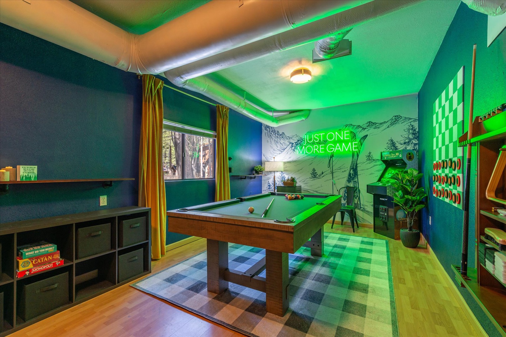 Challenge friends to a game of pool in your private entertainment room, complete with atmospheric lighting and cozy gaming atmosphere.