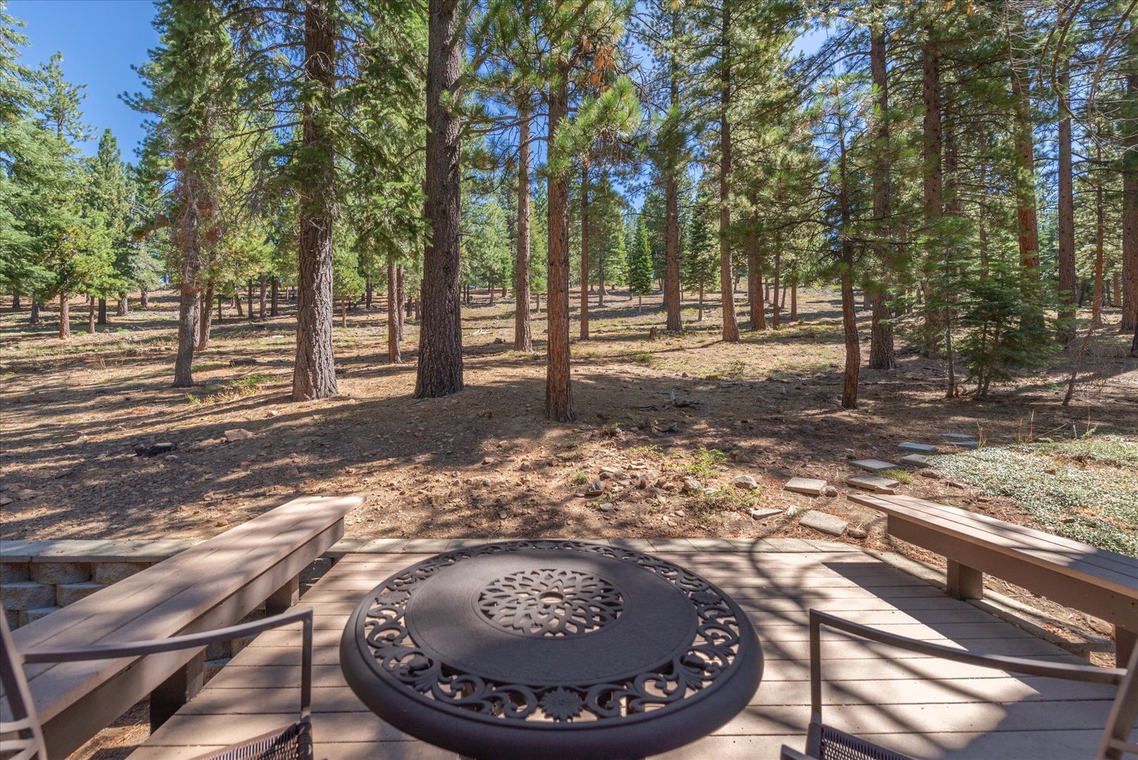 Gather around the café table on the back deck outside the bedroom, perfect for a quiet morning cup of coffee.