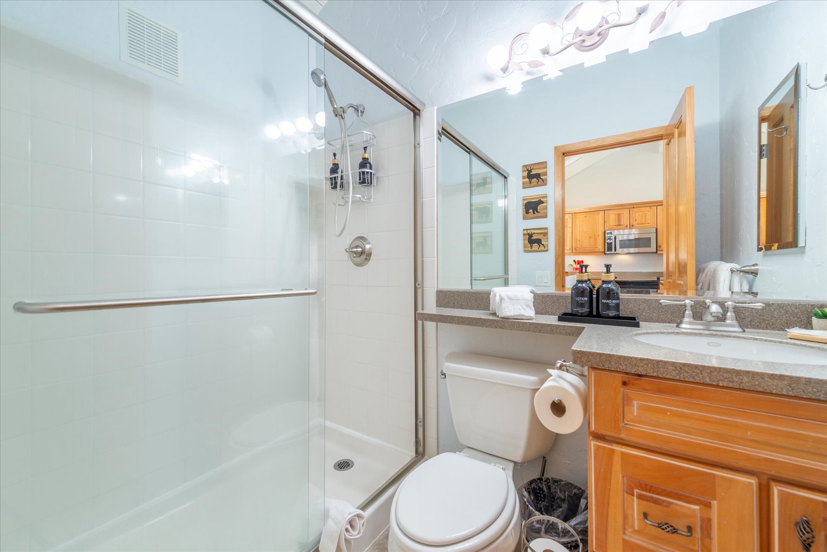 Refresh in your private bathroom with a spacious shower, plush towels, and everything you need for a comfortable stay.