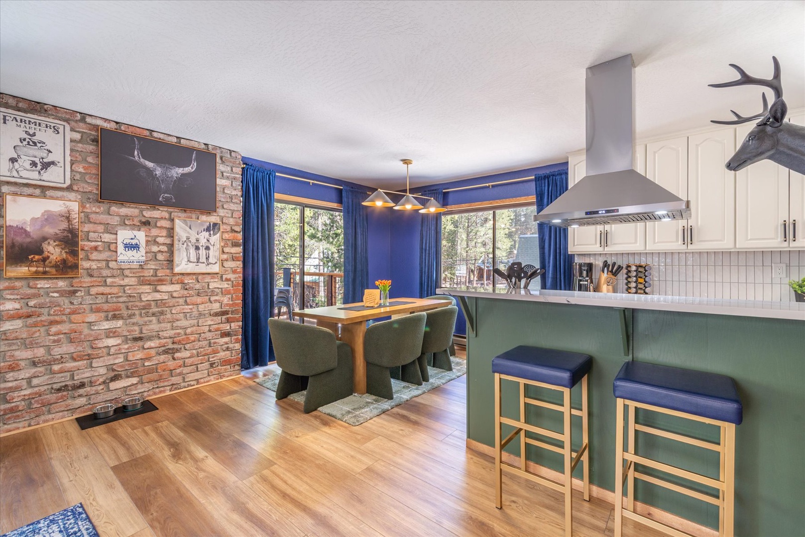 Your stylish open-plan kitchen and dining area blends rustic charm with modern comfort, perfect for cooking and gathering together.