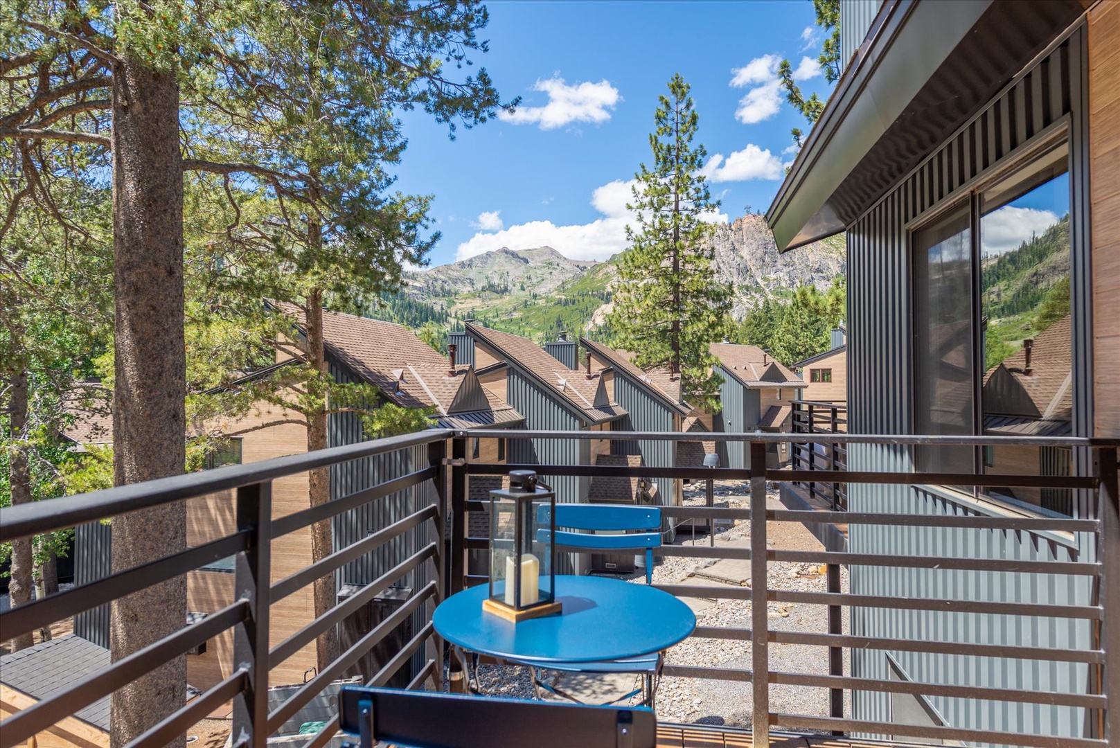Step onto your private balcony and drink in stunning mountain vistas framed by tall pines—perfect for morning coffee or evening relaxation in the fresh alpine air.