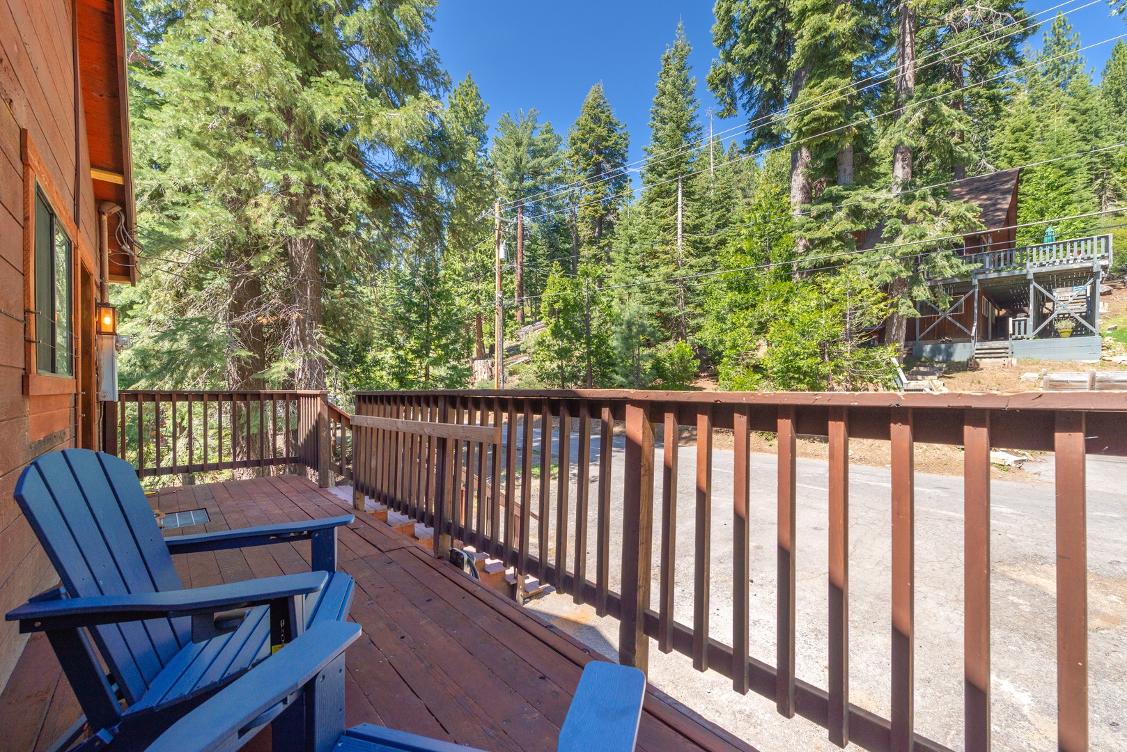 A peaceful forested retreat nestled among tall pines, offering easy access to mountain activities and tranquil surroundings.