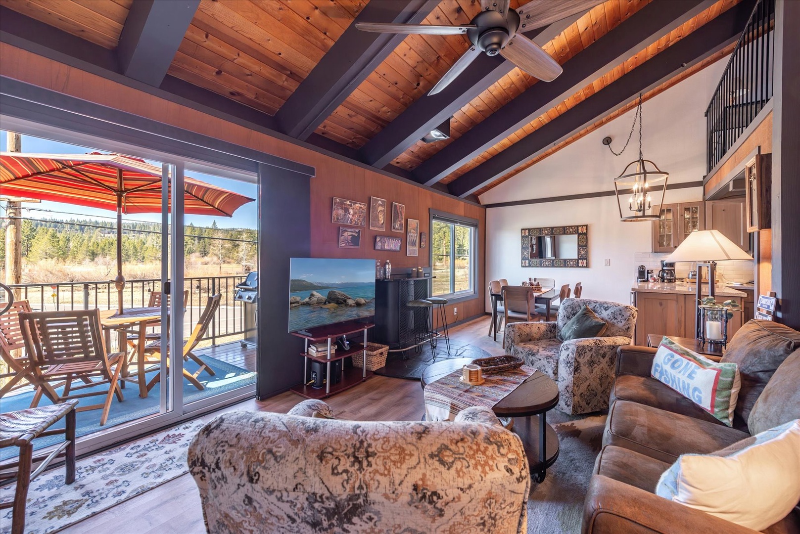Cozy into plush seating and enjoy the warm comforts of home at this lakeside condo.