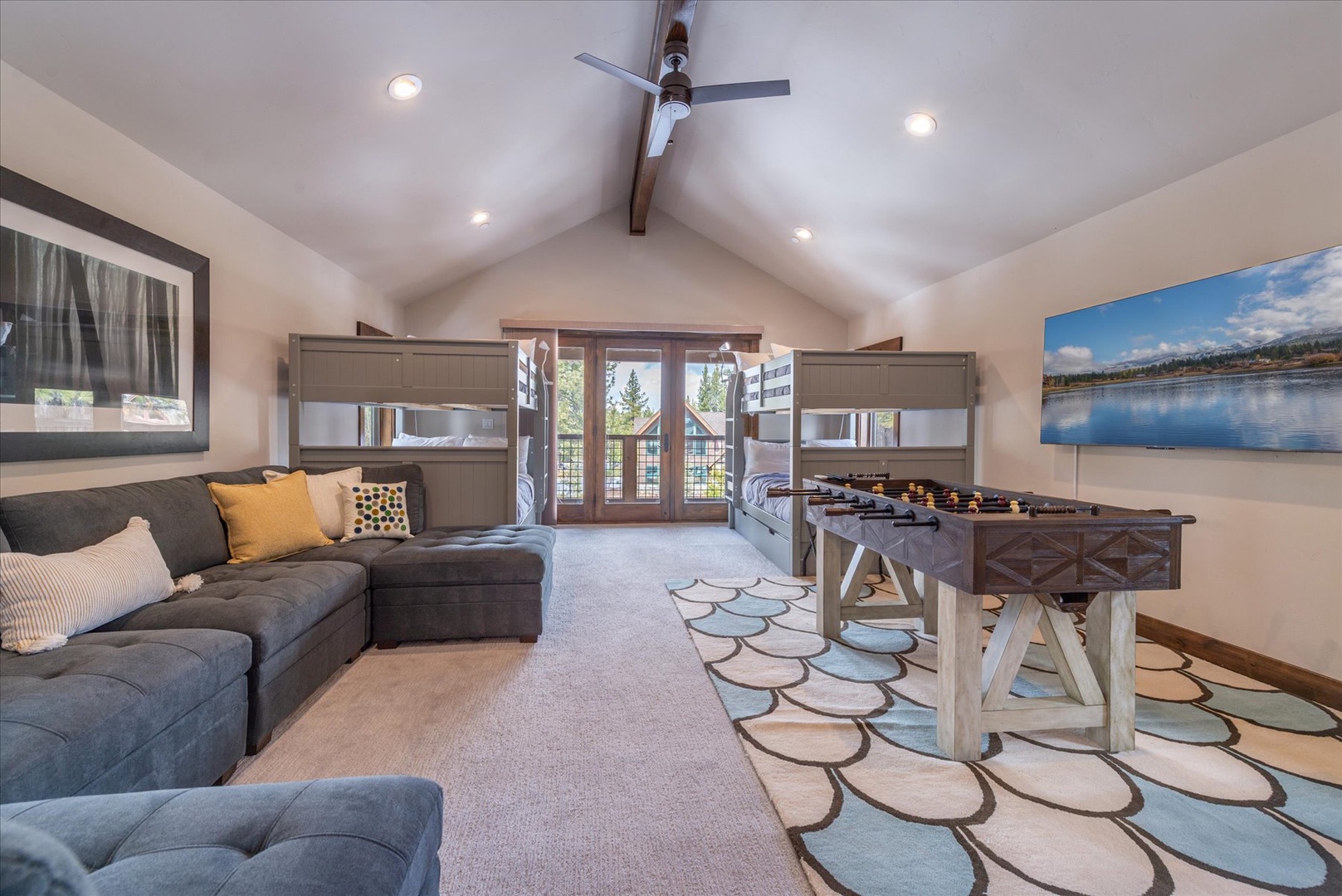 Your spacious family room features cozy bunk beds, a plush sectional, and a foosball table for endless entertainment.