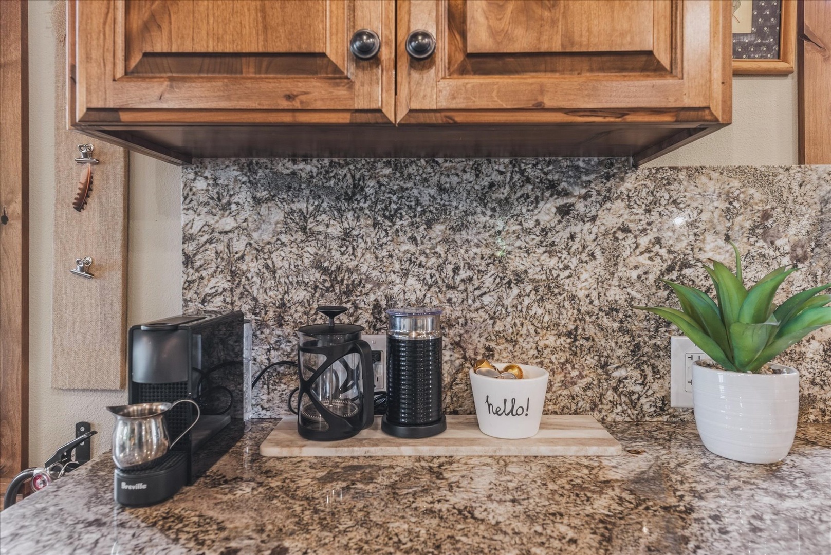 Start your mornings with ease at this thoughtfully equipped coffee station, complete with everything you need for a perfect cup right in your own kitchen.