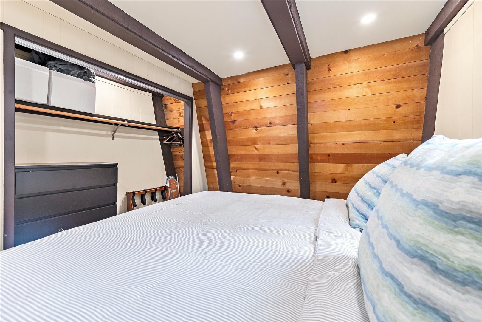Your cozy retreat features a comfortable bed and ample closet space for settling in.