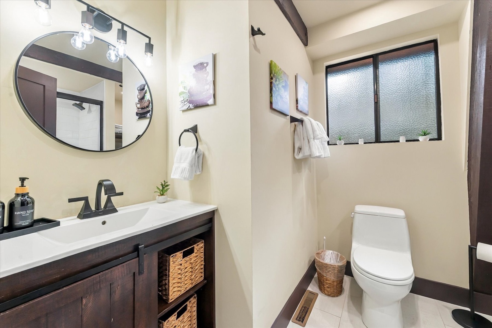 Freshen up in your thoughtfully designed downstairs bathroom with elegant details and modern fixtures that make every moment feel special.