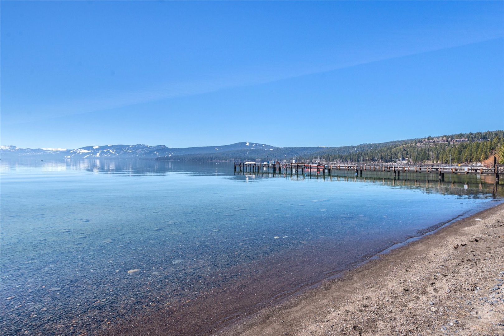 Take a dip surrounded by snow-capped mountains and forest.