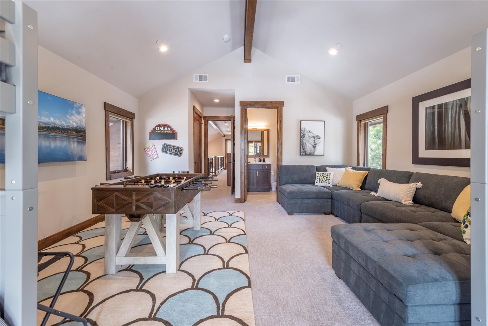 Have some fun in our large game room, ready to entertain the whole family with the large smart TV, couch, and foosball table.