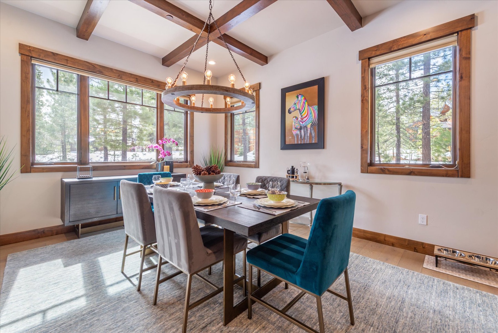 Enjoy family meals at your fun modern dining area surrounded by forest views.