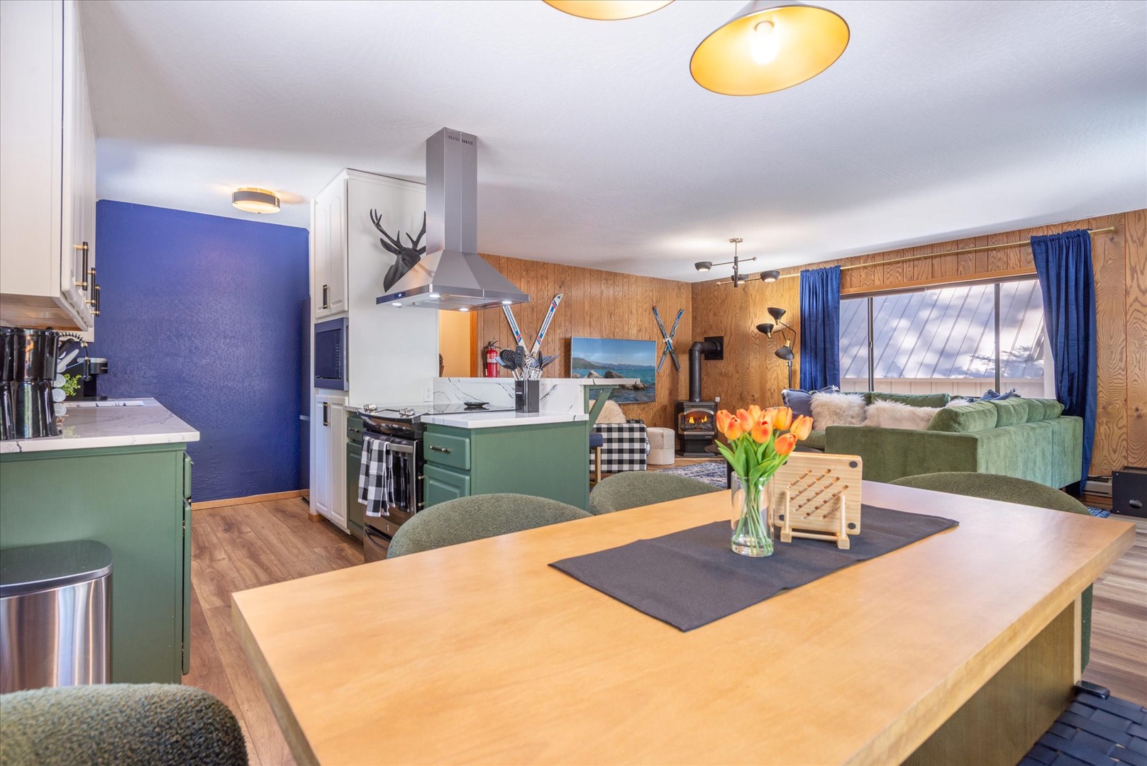 Your open kitchen flows into your living space, keeping everyone connected as you make meals and relax.